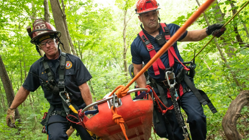 Paramedics in forest doing a mission